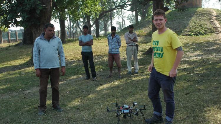 Kasper Hanus prepares the drone for flight. Photo by E. Smagur.