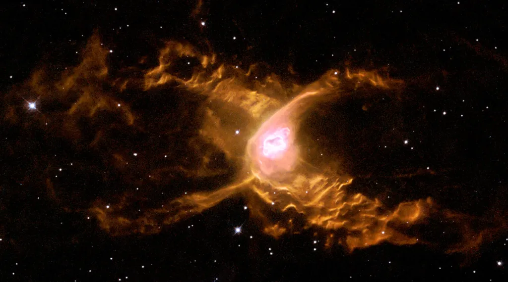 Mgławica planetarna NGC 6537 (HST) “Czerwony Pająk”  ESA & Garrelt Mellema (Leiden University, the Netherlands) - «Surfing in Sagittarius - not for the faint-hearted!»