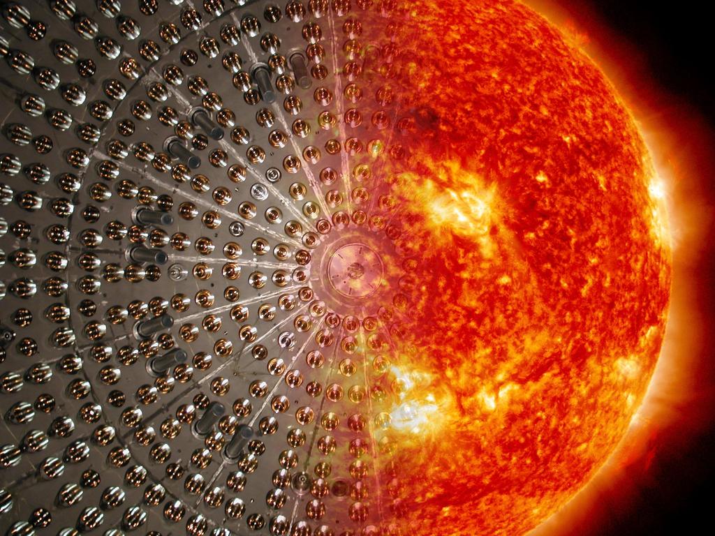 Artystyczna wizja sfery detektora BOREXINO w połączeniu z tarczą słoneczną.  Fot: Maxim Gromov, Borexino Collaboration