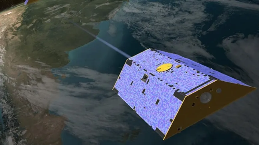 Misja GRACE do pomiarów zmian ziemskiej grawitacji (źródło: NASA) (satelita nad kulą ziemską)