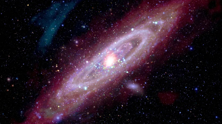 Galaktyka M31 w Andromedzie. Obraz stanowi połączenie danych z różnych długości fali z przypisanym im dla wizualizacji barwami. Źródło: NASA, Marcel Drechsler, Xavier Strottner, Yann Sainty & J. Sahner, T. Kottary, przetwarzanie obrazu: L. Frattare, K. Arcand, J. Major.