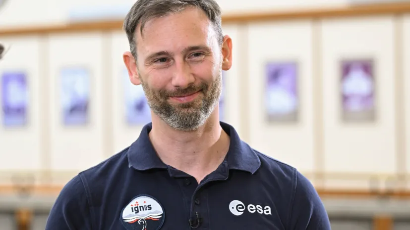 25.06.2026. Astronauta ESA Sławosz Uznański-Wiśniewski podczas konferencji naukowej „Ekosystem kosmiczny rok po misji IGNIS” z okazji pierwszej rocznicy lotu na Międzynarodową Stację Kosmiczną, 25 bm. w Szkole Głównej Handlowej w Warszawie. (mr) PAP/Radek Pietruszka